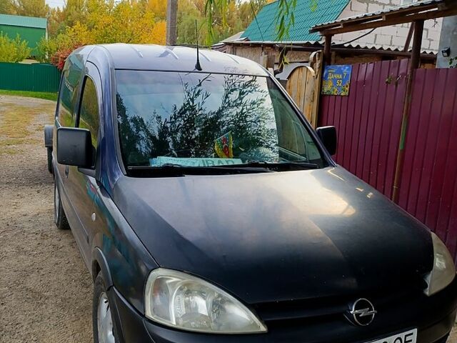 Синий Опель Комбо груз.-пасс., объемом двигателя 1.2 л и пробегом 350 тыс. км за 2500 $, фото 1 на Automoto.ua