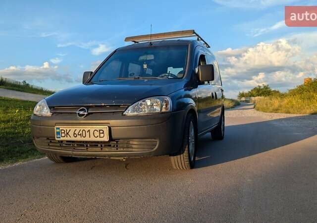 Синий Опель Комбо груз.-пасс., объемом двигателя 1.6 л и пробегом 100 тыс. км за 3400 $, фото 1 на Automoto.ua