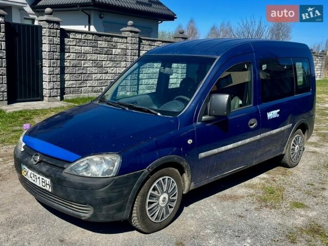 Синий Опель Комбо груз.-пасс., объемом двигателя 1.69 л и пробегом 320 тыс. км за 2450 $, фото 1 на Automoto.ua