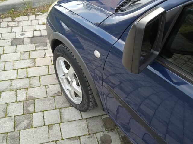 Синий Опель Комбо груз.-пасс., объемом двигателя 1.2 л и пробегом 260 тыс. км за 4600 $, фото 1 на Automoto.ua