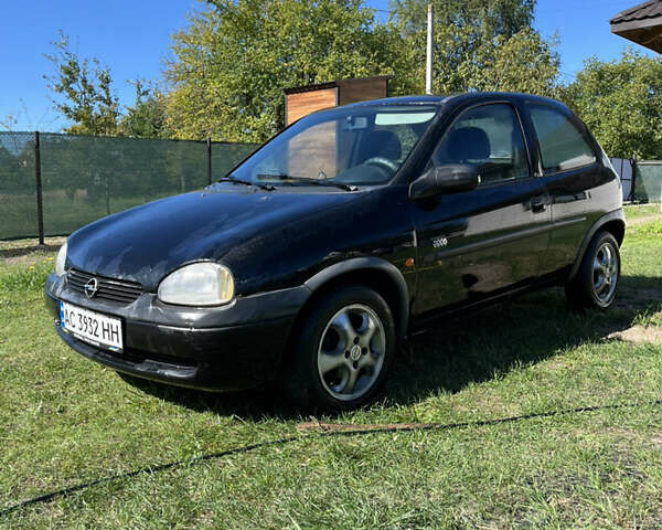 Черный Опель Корса, объемом двигателя 1.2 л и пробегом 400 тыс. км за 2400 $, фото 1 на Automoto.ua