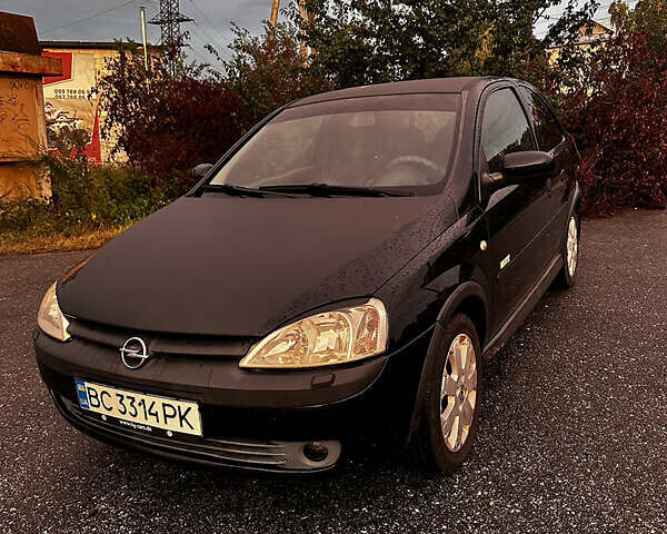 Чорний Опель Корса, об'ємом двигуна 1.23 л та пробігом 328 тис. км за 3100 $, фото 1 на Automoto.ua