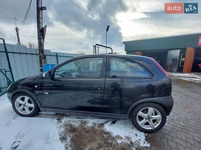 Черный Опель Корса, объемом двигателя 1.2 л и пробегом 140 тыс. км за 3200 $, фото 1 на Automoto.ua