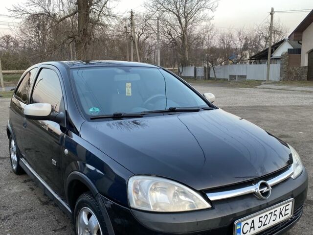 Черный Опель Корса, объемом двигателя 1 л и пробегом 260 тыс. км за 2500 $, фото 1 на Automoto.ua