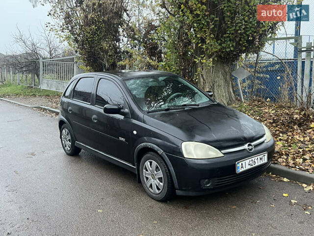 Черный Опель Корса, объемом двигателя 1.39 л и пробегом 280 тыс. км за 2200 $, фото 1 на Automoto.ua