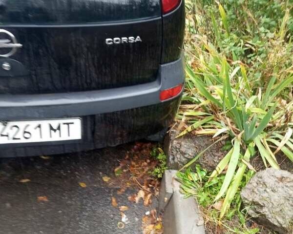 Черный Опель Корса, объемом двигателя 1.39 л и пробегом 365 тыс. км за 2500 $, фото 1 на Automoto.ua