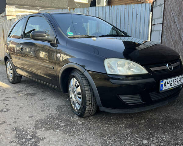 Черный Опель Корса, объемом двигателя 1.2 л и пробегом 224 тыс. км за 2600 $, фото 1 на Automoto.ua