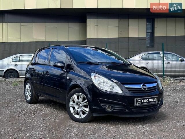 Чорний Опель Корса, об'ємом двигуна 1.23 л та пробігом 186 тис. км за 4590 $, фото 1 на Automoto.ua