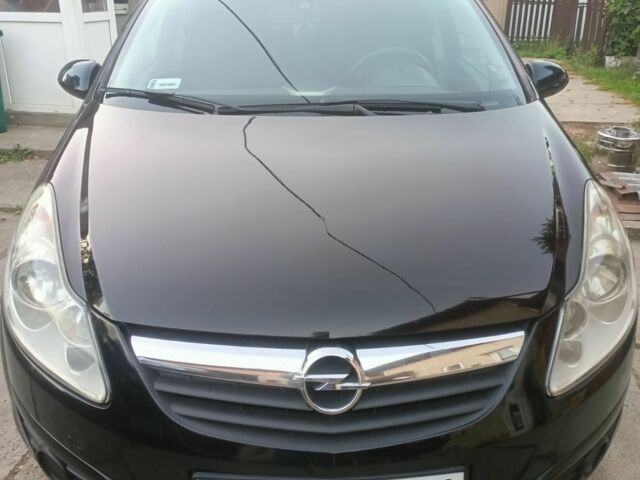 Черный Опель Корса, объемом двигателя 1.2 л и пробегом 209 тыс. км за 4600 $, фото 1 на Automoto.ua