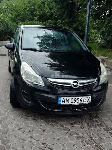 Черный Опель Корса, объемом двигателя 1.25 л и пробегом 218 тыс. км за 5800 $, фото 1 на Automoto.ua