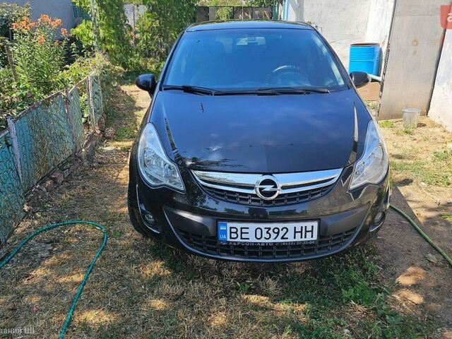 Чорний Опель Корса, об'ємом двигуна 1.23 л та пробігом 110 тис. км за 7300 $, фото 1 на Automoto.ua
