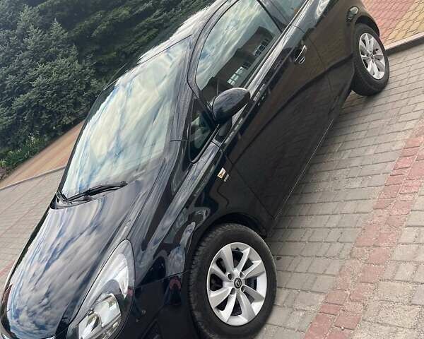 Черный Опель Корса, объемом двигателя 1.2 л и пробегом 125 тыс. км за 6200 $, фото 1 на Automoto.ua