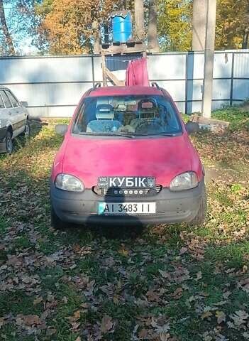 Красный Опель Корса, объемом двигателя 1.2 л и пробегом 222 тыс. км за 1318 $, фото 1 на Automoto.ua