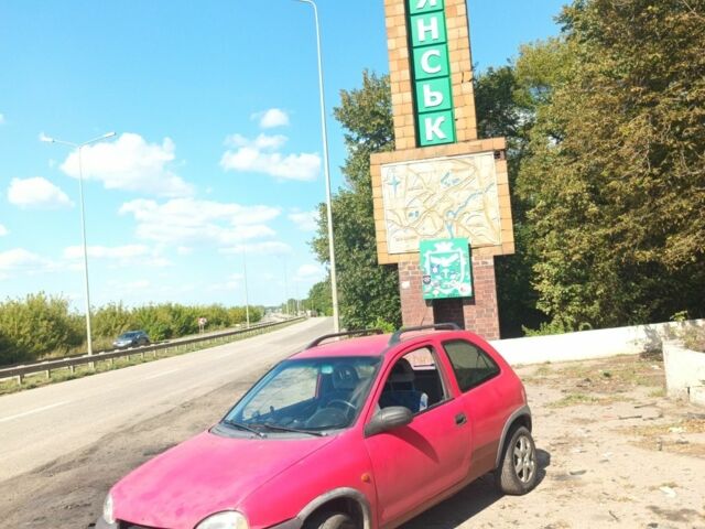 Красный Опель Корса, объемом двигателя 1.2 л и пробегом 222 тыс. км за 1318 $, фото 1 на Automoto.ua