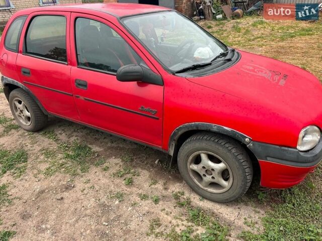 Красный Опель Корса, объемом двигателя 0 л и пробегом 203 тыс. км за 975 $, фото 1 на Automoto.ua