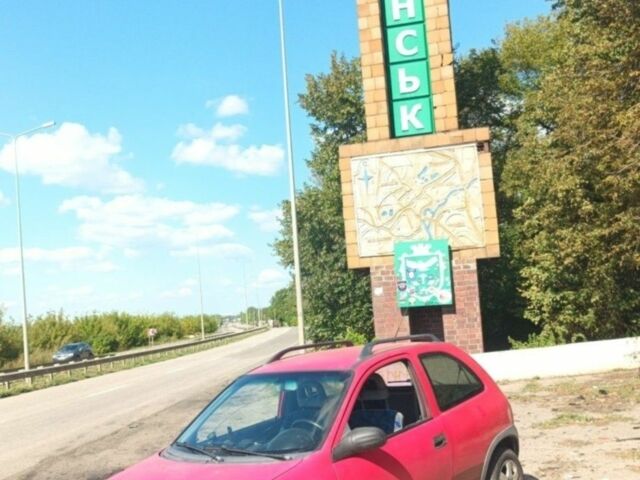 Красный Опель Корса, объемом двигателя 1.2 л и пробегом 250 тыс. км за 1182 $, фото 1 на Automoto.ua