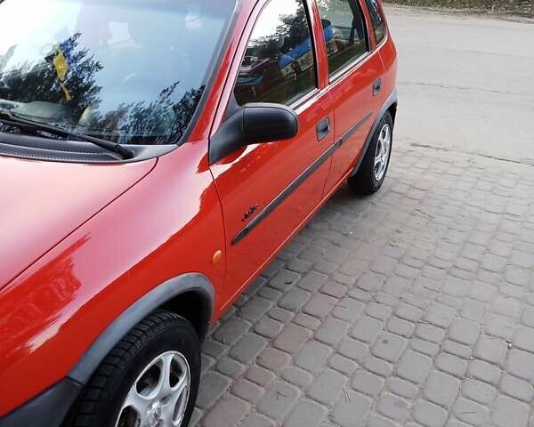 Красный Опель Корса, объемом двигателя 1.2 л и пробегом 130 тыс. км за 2800 $, фото 1 на Automoto.ua