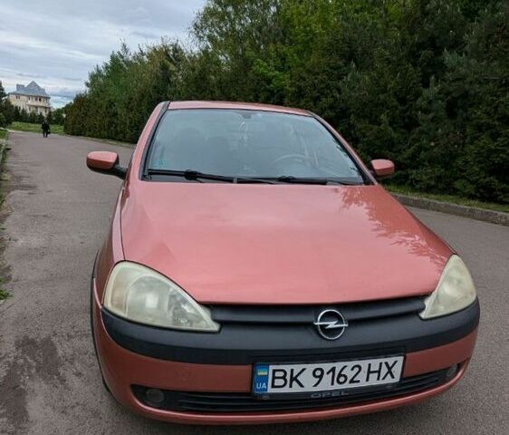 Красный Опель Корса, объемом двигателя 1.2 л и пробегом 139 тыс. км за 3500 $, фото 1 на Automoto.ua