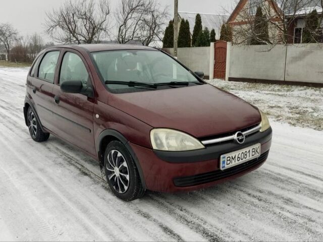 Красный Опель Корса, объемом двигателя 1 л и пробегом 216 тыс. км за 3300 $, фото 1 на Automoto.ua