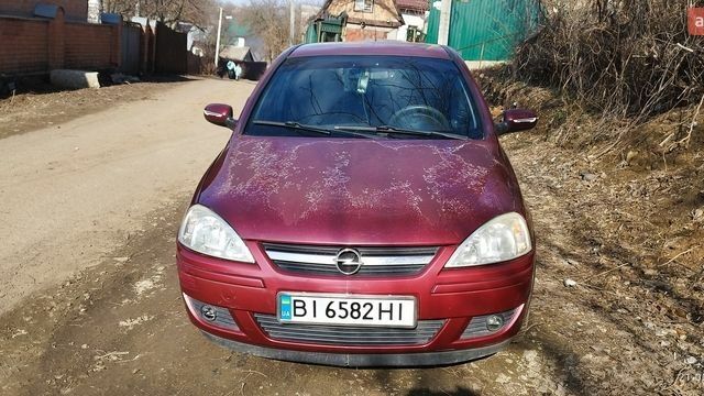 Червоний Опель Корса, об'ємом двигуна 1.2 л та пробігом 165 тис. км за 3100 $, фото 1 на Automoto.ua