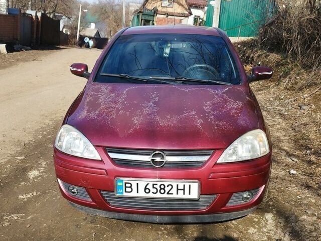 Червоний Опель Корса, об'ємом двигуна 1.2 л та пробігом 165 тис. км за 2900 $, фото 1 на Automoto.ua