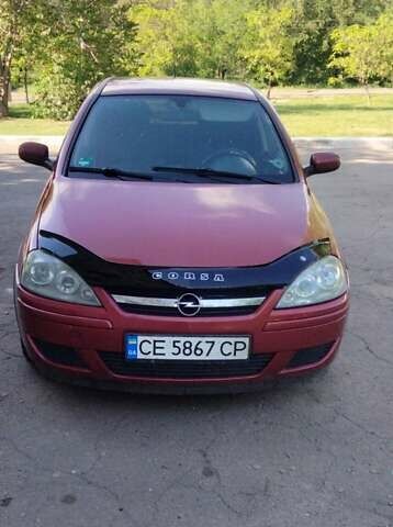 Красный Опель Корса, объемом двигателя 1.2 л и пробегом 310 тыс. км за 4000 $, фото 1 на Automoto.ua