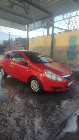 Червоний Опель Корса, об'ємом двигуна 1.23 л та пробігом 200 тис. км за 3800 $, фото 1 на Automoto.ua