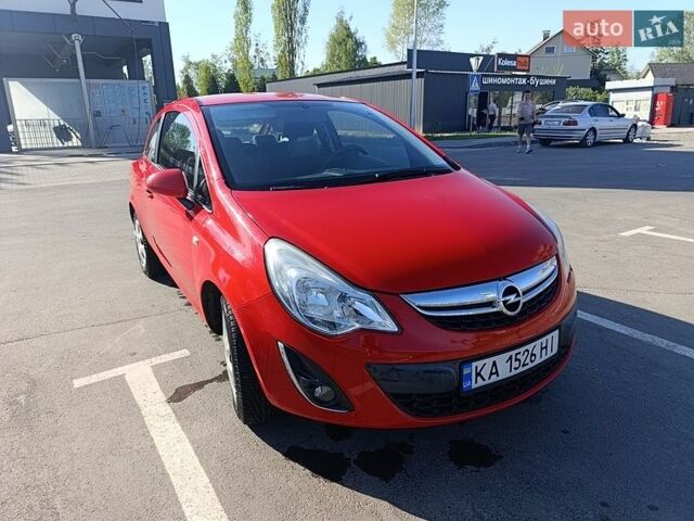 Красный Опель Корса, объемом двигателя 1.23 л и пробегом 131 тыс. км за 4900 $, фото 1 на Automoto.ua