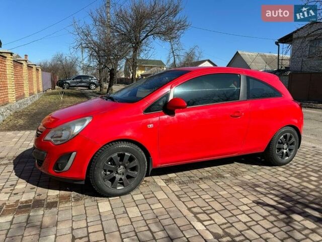 Красный Опель Корса, объемом двигателя 1.23 л и пробегом 195 тыс. км за 4650 $, фото 1 на Automoto.ua