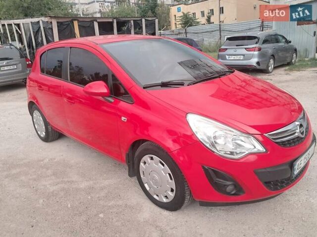 Красный Опель Корса, объемом двигателя 1.23 л и пробегом 133 тыс. км за 6999 $, фото 1 на Automoto.ua