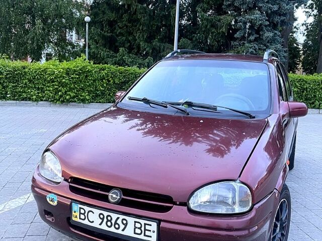 Красный Опель Корса, объемом двигателя 1.4 л и пробегом 309 тыс. км за 1510 $, фото 1 на Automoto.ua