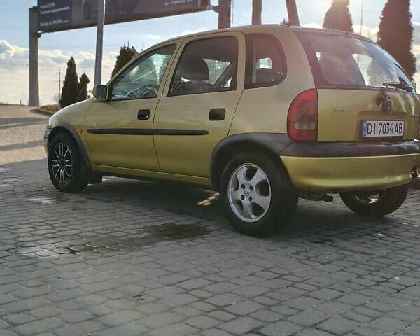 Жовтий Опель Корса, об'ємом двигуна 1 л та пробігом 203 тис. км за 1900 $, фото 1 на Automoto.ua