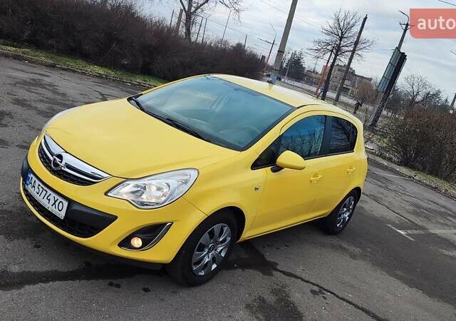 Жовтий Опель Корса, об'ємом двигуна 1.23 л та пробігом 90 тис. км за 6900 $, фото 1 на Automoto.ua