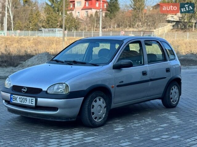 Серый Опель Корса, объемом двигателя 1.2 л и пробегом 221 тыс. км за 1950 $, фото 1 на Automoto.ua