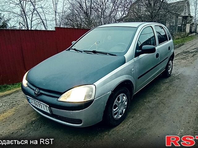 Сірий Опель Корса, об'ємом двигуна 1.2 л та пробігом 198 тис. км за 1950 $, фото 1 на Automoto.ua