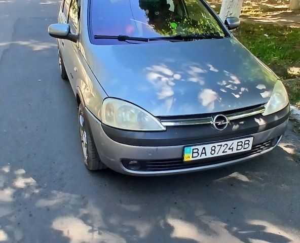 Серый Опель Корса, объемом двигателя 1.2 л и пробегом 163 тыс. км за 4000 $, фото 1 на Automoto.ua