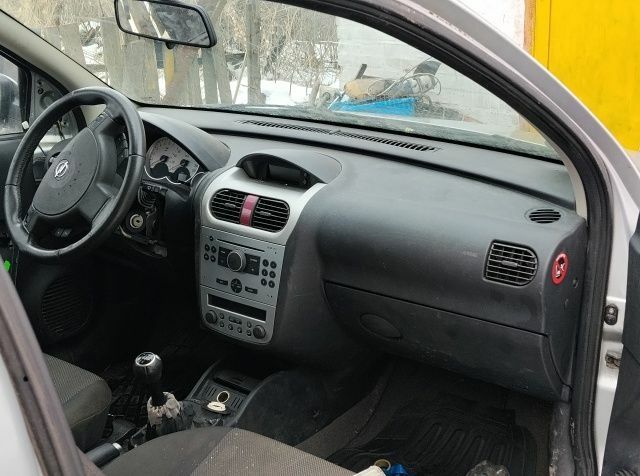 Серый Опель Корса, объемом двигателя 1 л и пробегом 100 тыс. км за 697 $, фото 1 на Automoto.ua