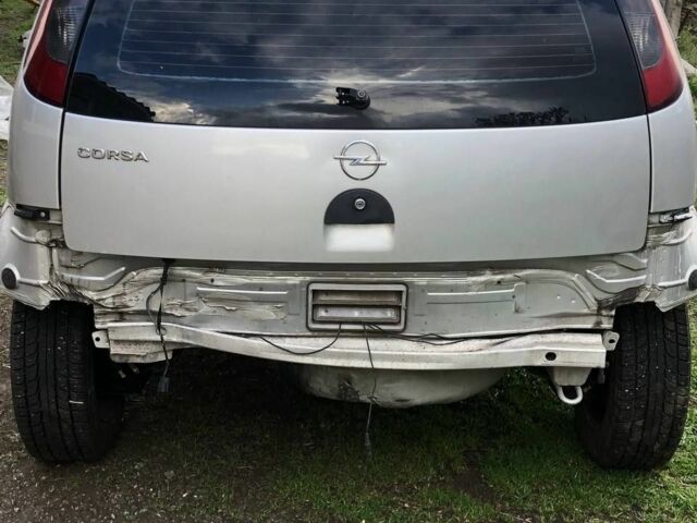 Серый Опель Корса, объемом двигателя 1 л и пробегом 194 тыс. км за 1700 $, фото 1 на Automoto.ua