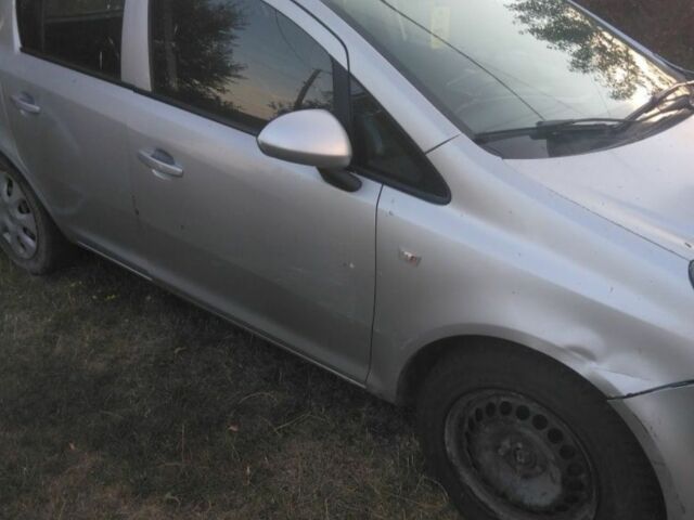 Серый Опель Корса, объемом двигателя 1 л и пробегом 240 тыс. км за 1650 $, фото 1 на Automoto.ua