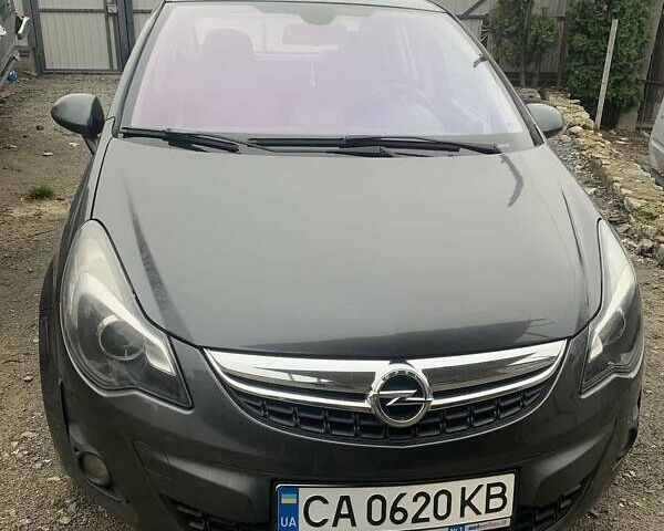 Серый Опель Корса, объемом двигателя 1.25 л и пробегом 218 тыс. км за 5700 $, фото 1 на Automoto.ua