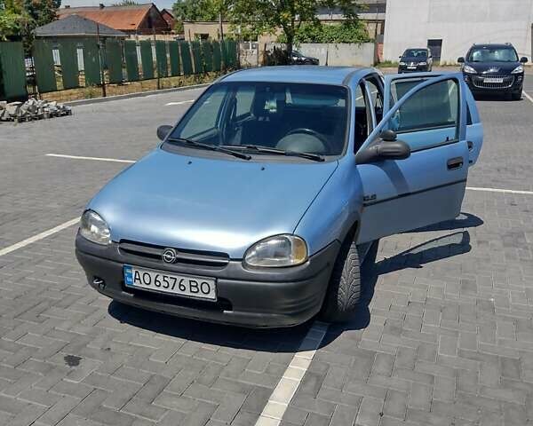 Синий Опель Корса, объемом двигателя 1.4 л и пробегом 210 тыс. км за 2200 $, фото 1 на Automoto.ua