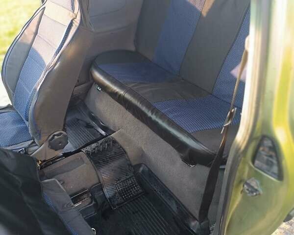 Зеленый Опель Корса, объемом двигателя 1.2 л и пробегом 300 тыс. км за 1900 $, фото 1 на Automoto.ua