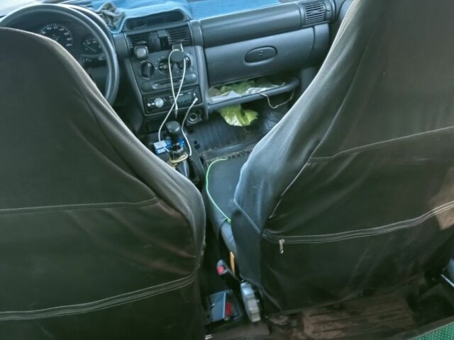 Зелений Опель Корса, об'ємом двигуна 1.2 л та пробігом 300 тис. км за 831 $, фото 1 на Automoto.ua