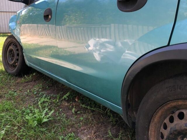 Зелений Опель Корса, об'ємом двигуна 1 л та пробігом 180 тис. км за 900 $, фото 1 на Automoto.ua