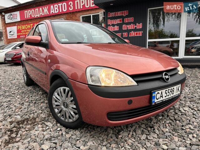 Помаранчевий Опель Корса, об'ємом двигуна 1 л та пробігом 143 тис. км за 2600 $, фото 1 на Automoto.ua
