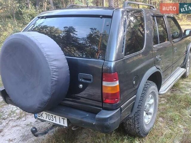 Черный Опель Фронтера, объемом двигателя 2.4 л и пробегом 319 тыс. км за 4800 $, фото 1 на Automoto.ua