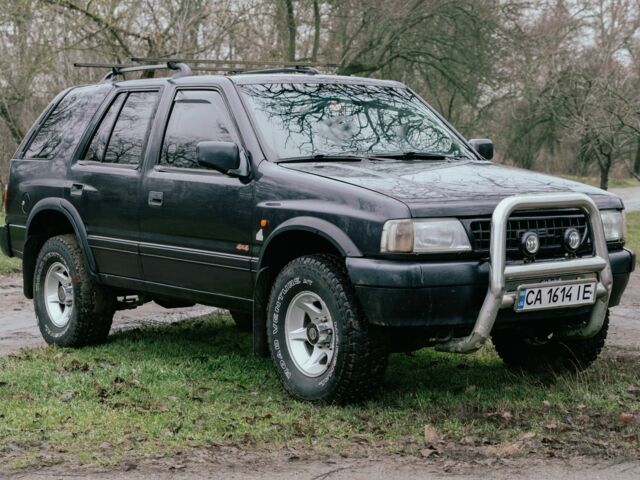 Черный Опель Фронтера, объемом двигателя 2.3 л и пробегом 505 тыс. км за 3700 $, фото 1 на Automoto.ua