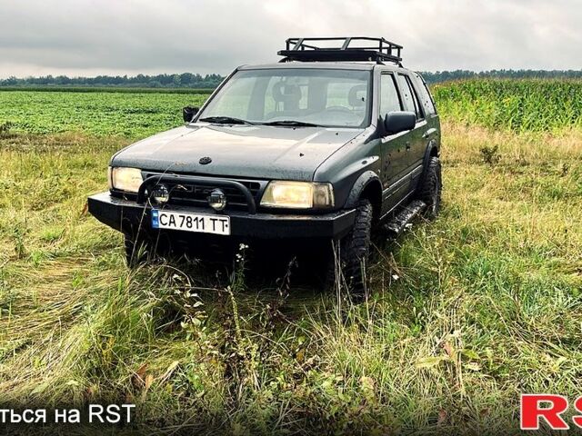 Черный Опель Фронтера, объемом двигателя 2.4 л и пробегом 330 тыс. км за 3100 $, фото 1 на Automoto.ua