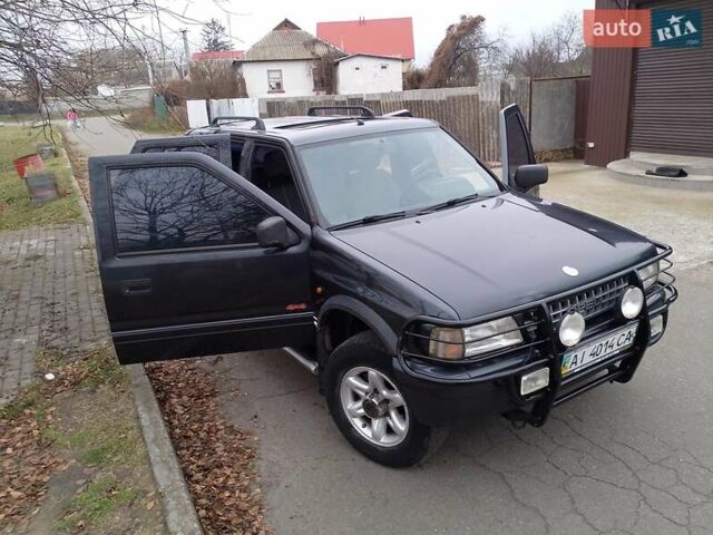 Черный Опель Фронтера, объемом двигателя 2.2 л и пробегом 329 тыс. км за 4999 $, фото 1 на Automoto.ua