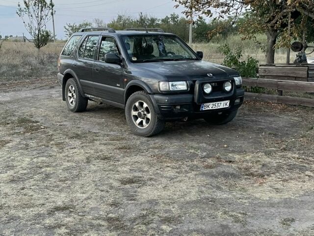 Чорний Опель Фронтера, об'ємом двигуна 2.2 л та пробігом 258 тис. км за 1861 $, фото 1 на Automoto.ua